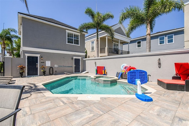 7523 Excitement Dr, Kissimmee, FL 34747 - view of pool featuring a patio and a pool with connected hot tub