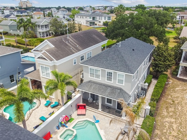 7523 Excitement Dr, Kissimmee, FL 34747 - aerial perspective of suburban area with a pool area