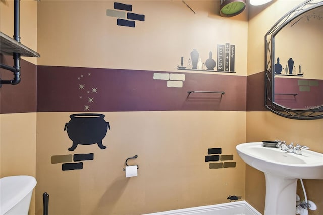 7523 Excitement Dr, Kissimmee, FL 34747 - half bathroom featuring toilet