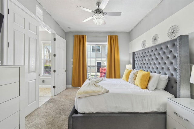 7523 Excitement Dr, Kissimmee, FL 34747 - bedroom with light carpet, ceiling fan, and baseboards