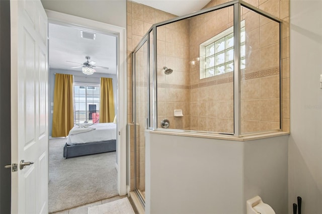 7523 Excitement Dr, Kissimmee, FL 34747 - bathroom with ensuite bathroom, a shower stall, and a ceiling fan