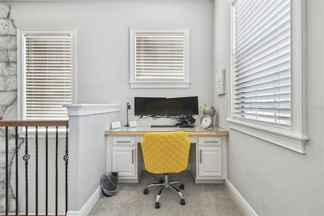 7523 Excitement Dr, Kissimmee, FL 34747 - carpeted home office with baseboards and built in study area
