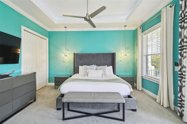 7523 Excitement Dr, Kissimmee, FL 34747 - bedroom featuring a raised ceiling, carpet, crown molding, and ceiling fan