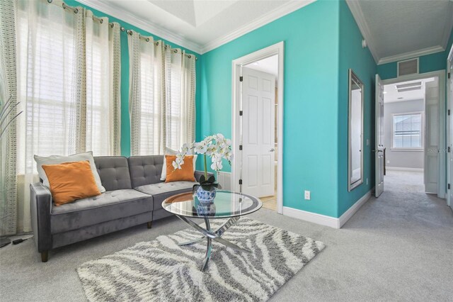 7523 Excitement Dr, Kissimmee, FL 34747 - living room featuring crown molding, carpet flooring, and baseboards