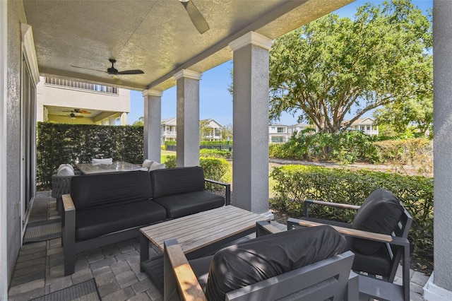7523 Excitement Dr, Kissimmee, FL 34747 - view of patio featuring a ceiling fan, an outdoor hangout area, and a residential view