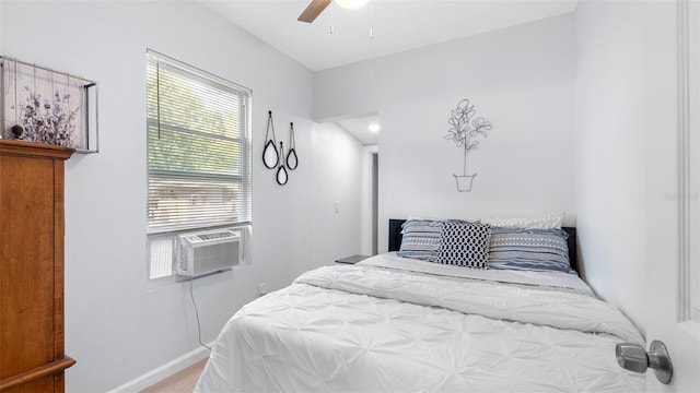 1615 28th Ave N, Saint Petersburg, FL 33713 - bedroom with baseboards, cooling unit, and ceiling fan