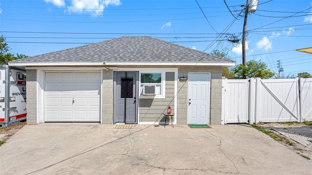 1615 28th Ave N, Saint Petersburg, FL 33713 - garage featuring a gate and cooling unit