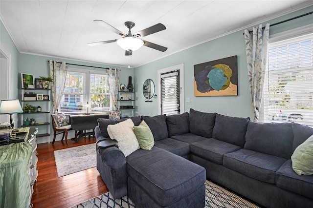 634 6th St N, Saint Petersburg, FL 33701 - living area featuring dark wood-style flooring, crown molding, and a ceiling fan