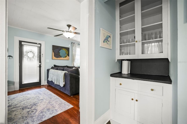 634 6th St N, Saint Petersburg, FL 33701 - bar featuring ornamental molding, dark wood finished floors, and ceiling fan