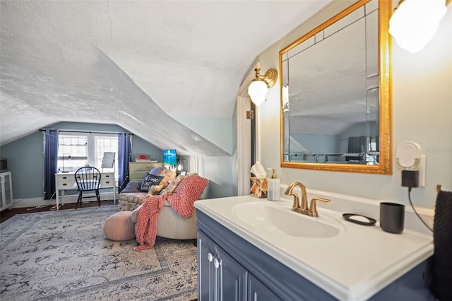 634 6th St N, Saint Petersburg, FL 33701 - bathroom with vaulted ceiling and vanity