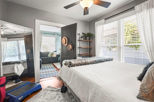 634 6th St N, Saint Petersburg, FL 33701 - bedroom featuring wood finished floors and a ceiling fan