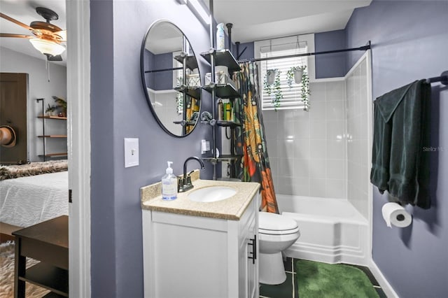 634 6th St N, Saint Petersburg, FL 33701 - full bathroom with vanity, toilet, ceiling fan, and shower / bathtub combination with curtain