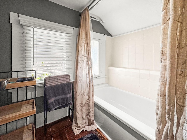 634 6th St N, Saint Petersburg, FL 33701 - bathroom with vaulted ceiling and wood finished floors