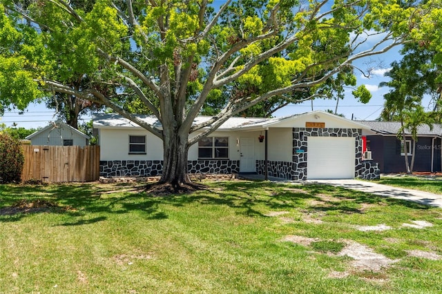 1851 Oklahoma Ave NE, Saint Petersburg, FL 33703 - ranch-style house with an attached garage and concrete driveway