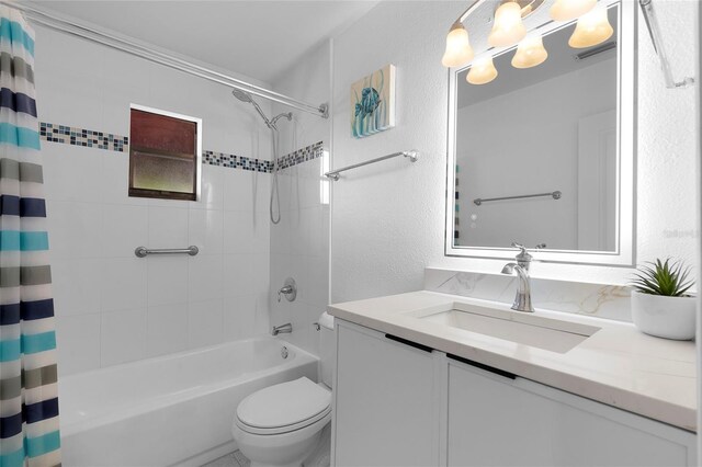 1851 Oklahoma Ave NE, Saint Petersburg, FL 33703 - bathroom with vanity, shower / bath combo, toilet, and a textured wall