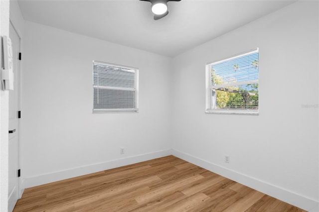 1851 Oklahoma Ave NE, Saint Petersburg, FL 33703 - spare room with ceiling fan, baseboards, and light wood finished floors