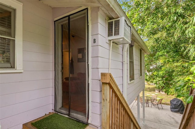 1115 Highland St N, Saint Petersburg, FL 33701 - view of exterior entry featuring a patio