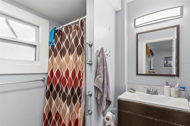 1115 Highland St N, Saint Petersburg, FL 33701 - bathroom with vanity and curtained shower