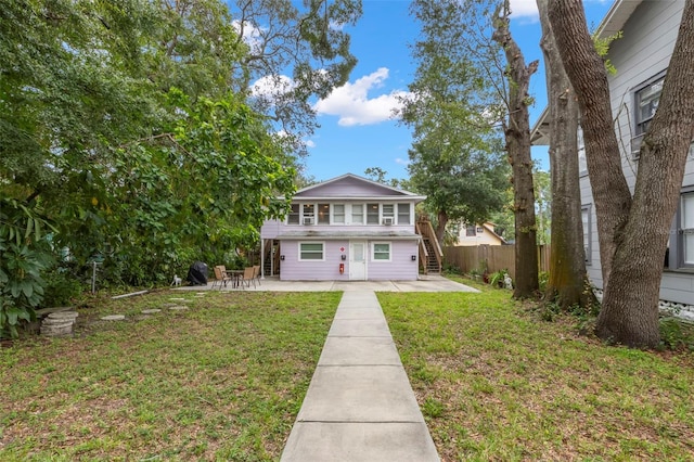 1115 Highland St N, Saint Petersburg, FL 33701 - view of front facade featuring a patio