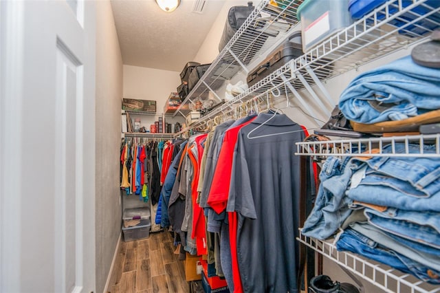 14365 Evans Ranch Rd, Lakeland, FL 33809 - walk in closet featuring wood finished floors