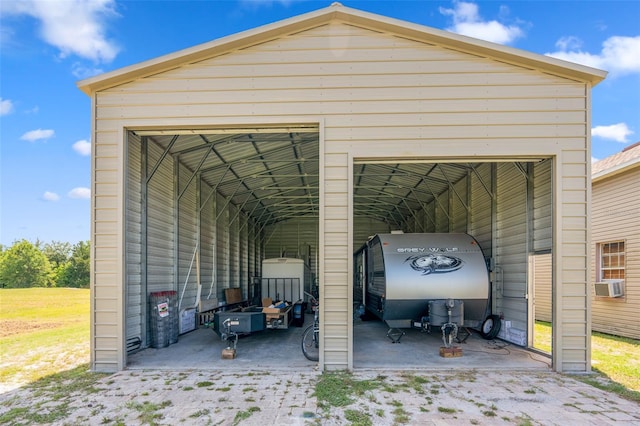 14365 Evans Ranch Rd, Lakeland, FL 33809 - view of vehicle parking featuring cooling unit and a detached garage