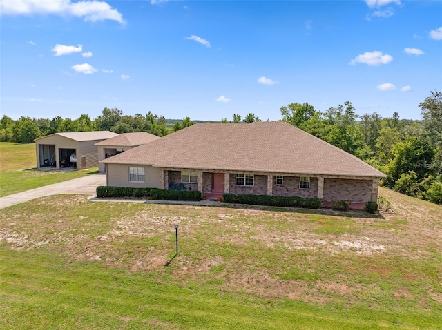 14365 Evans Ranch Rd, Lakeland, FL 33809 - single story home with a front yard, driveway, and a shingled roof