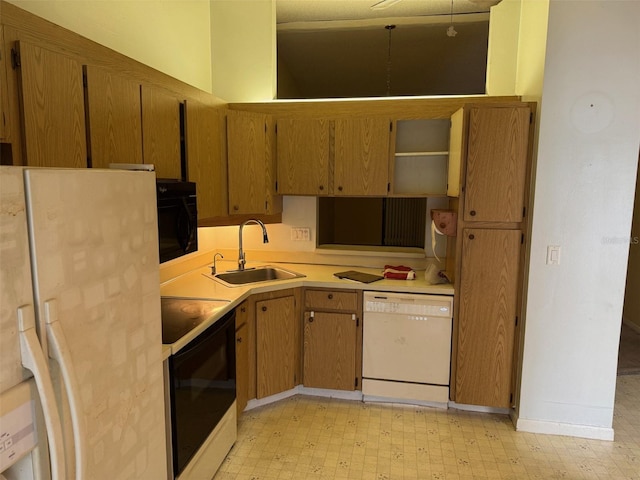 1371 Pine Ridge Cir E Unit B8, Tarpon Springs, FL 34688 - kitchen with white appliances, light flooring, a sink, light countertops, and open shelves