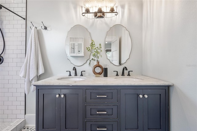 5301 N Central Ave, Tampa, FL 33603 - bathroom with double vanity, tiled shower, and a chandelier