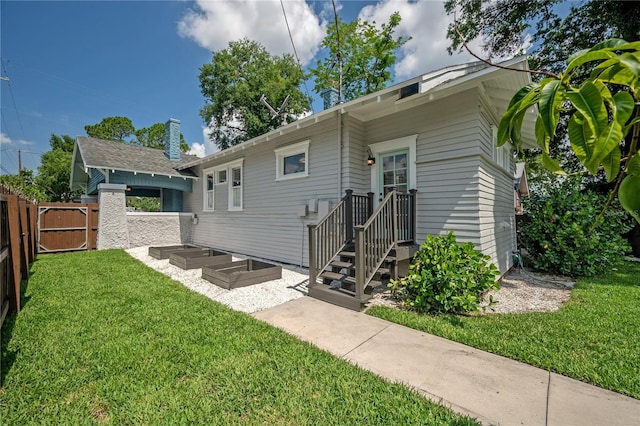 5301 N Central Ave, Tampa, FL 33603 - back of house with a gate