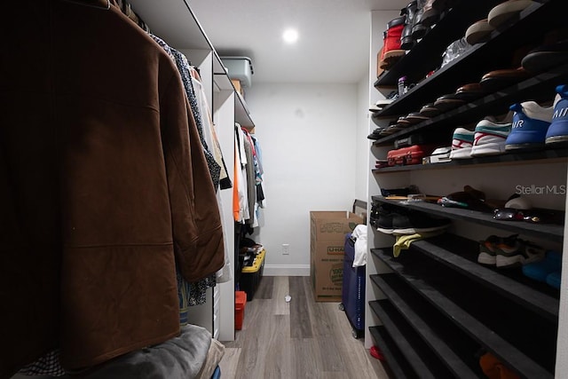 1816 W Lake Parker Dr, Lakeland, FL 33805 - walk in closet with wood finished floors