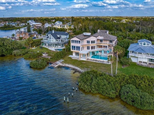 812 Point Seaside Dr, Crystal Beach, FL 34681 - view from above of property featuring a large body of water and a pool