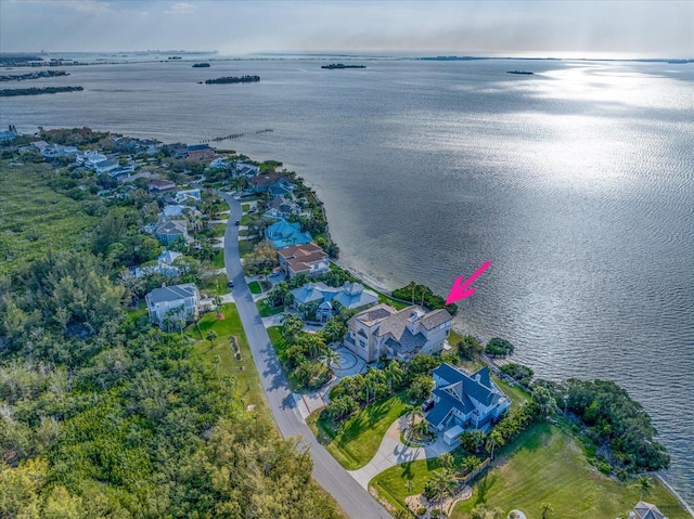 812 Point Seaside Dr, Crystal Beach, FL 34681 - aerial perspective of suburban area with a large body of water