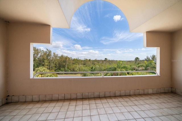 812 Point Seaside Dr, Crystal Beach, FL 34681 - balcony with a wooded view