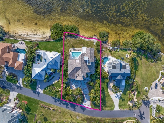 812 Point Seaside Dr, Crystal Beach, FL 34681 - aerial view of property's location featuring property boundaries highlighted and a pool