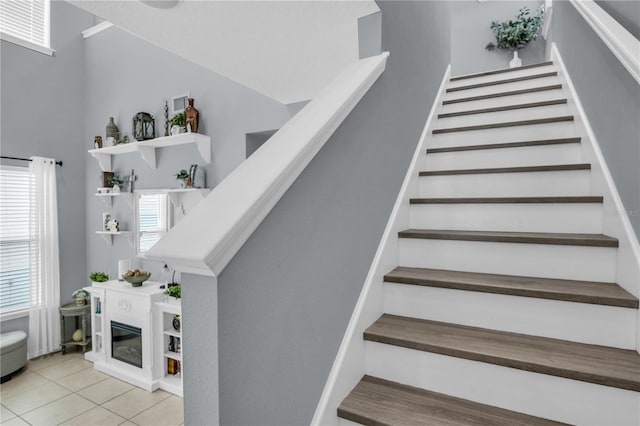 7238 Milestone Dr, Apollo Beach, FL 33572 - stairway with healthy amount of natural light and tile patterned floors
