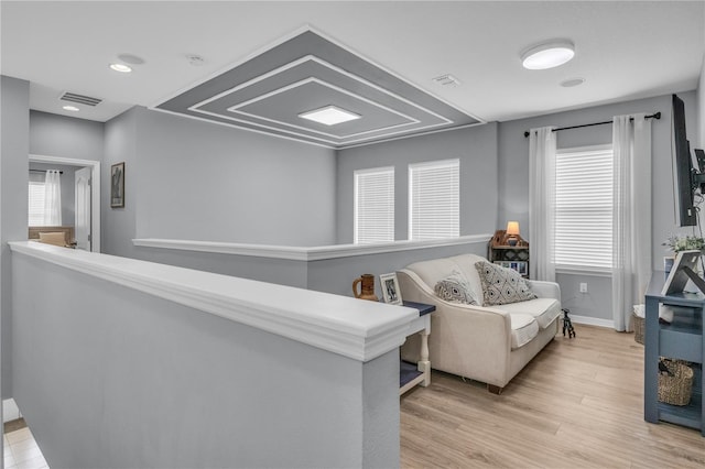 7238 Milestone Dr, Apollo Beach, FL 33572 - sitting room featuring wood finished floors, baseboards, an upstairs landing, and recessed lighting