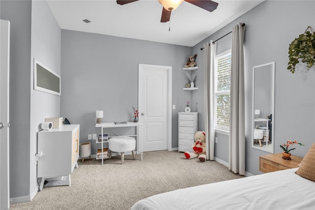 7238 Milestone Dr, Apollo Beach, FL 33572 - carpeted bedroom featuring baseboards and ceiling fan