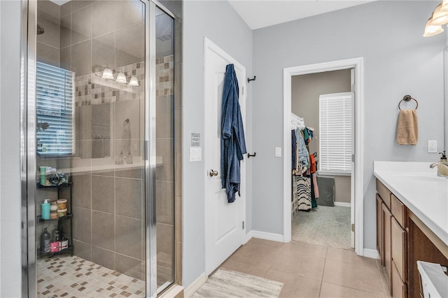 7238 Milestone Dr, Apollo Beach, FL 33572 - full bath with vanity, tile patterned flooring, and a stall shower