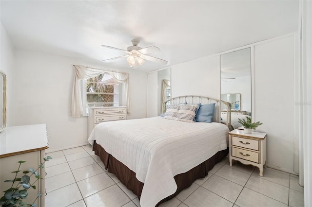 4229 Glissade Dr, New Port Richey, FL 34652 - bedroom featuring light tile patterned floors and ceiling fan