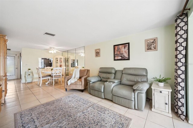 4229 Glissade Dr, New Port Richey, FL 34652 - living room featuring a ceiling fan and light tile patterned floors
