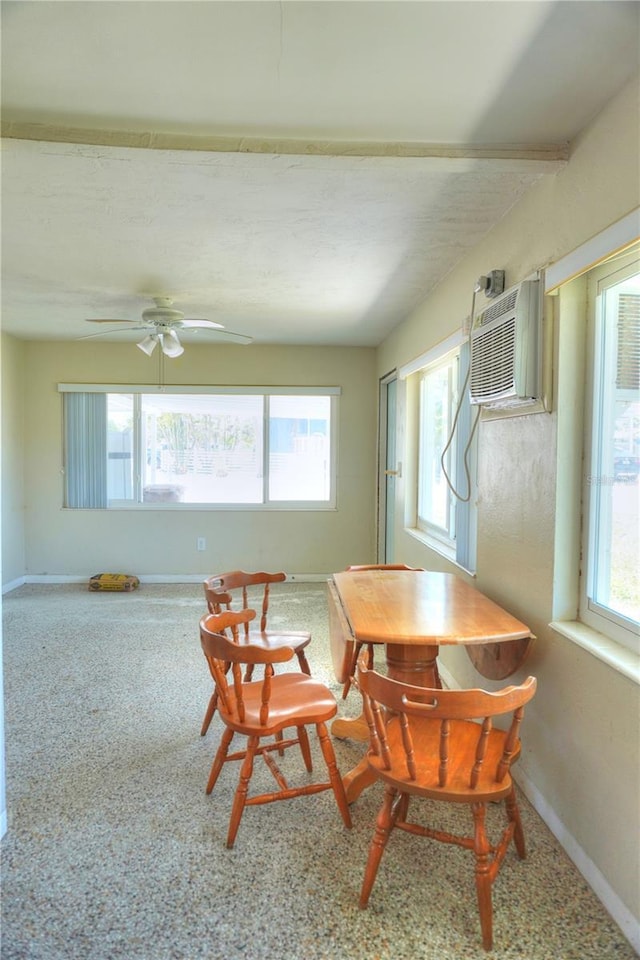 14501 N Bayshore Dr, Madeira Beach, FL 33708 - dining space featuring baseboards and a ceiling fan