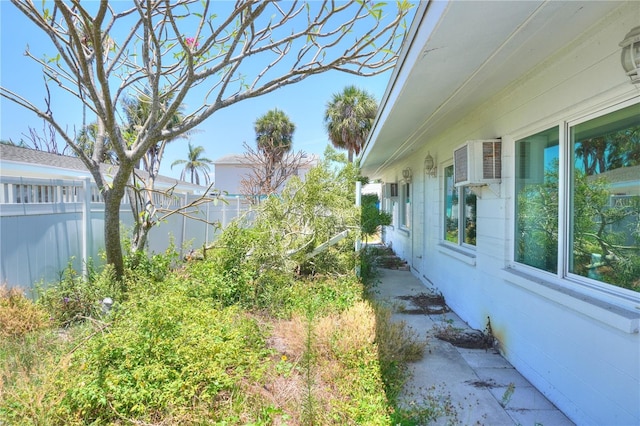 14501 N Bayshore Dr, Madeira Beach, FL 33708 - view of yard with a wall mounted AC