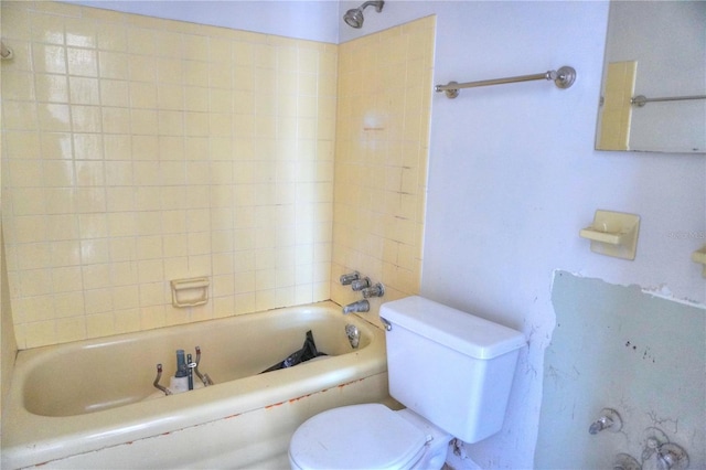 14501 N Bayshore Dr, Madeira Beach, FL 33708 - full bathroom featuring toilet and bathing tub / shower combination