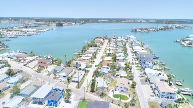 14501 N Bayshore Dr, Madeira Beach, FL 33708 - aerial overview of property's location with a nearby body of water, a marina, and nearby suburban area