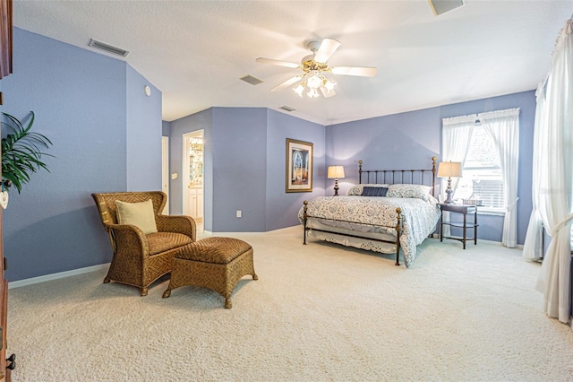 350 2nd St N Unit 1, Saint Petersburg, FL 33701 - bedroom with carpet floors, a ceiling fan, baseboards, and connected bathroom