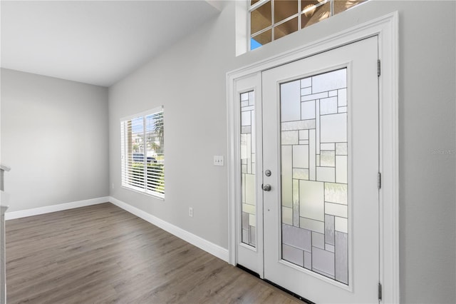 4852 Trinidad Dr, Land O Lakes, FL 34639 - entrance foyer with wood finished floors and baseboards