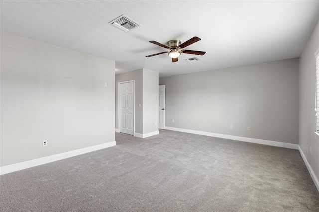 4852 Trinidad Dr, Land O Lakes, FL 34639 - carpeted empty room with a ceiling fan and baseboards