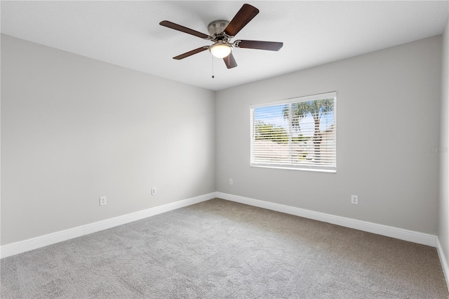 4852 Trinidad Dr, Land O Lakes, FL 34639 - empty room with carpet, baseboards, and a ceiling fan