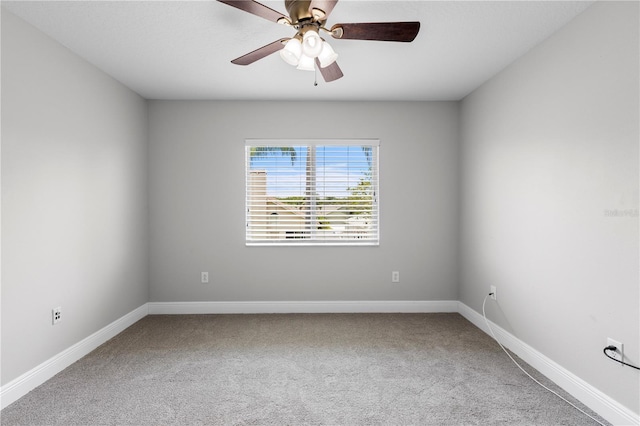 4852 Trinidad Dr, Land O Lakes, FL 34639 - carpeted spare room with baseboards and a ceiling fan