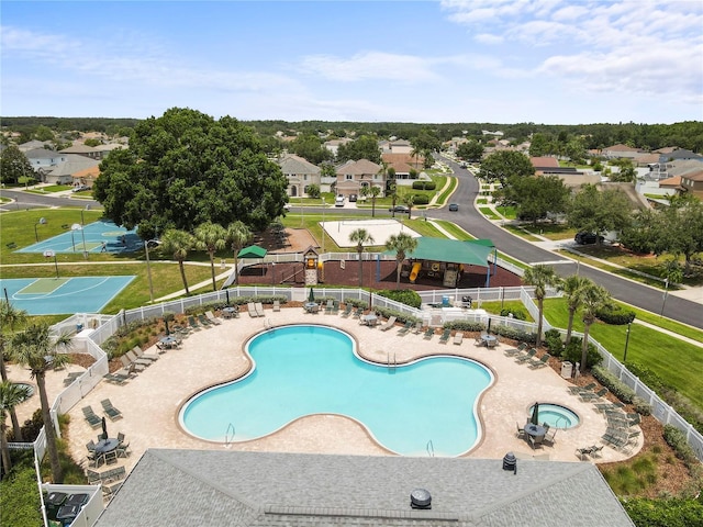 4852 Trinidad Dr, Land O Lakes, FL 34639 - community pool with a residential view and a patio area